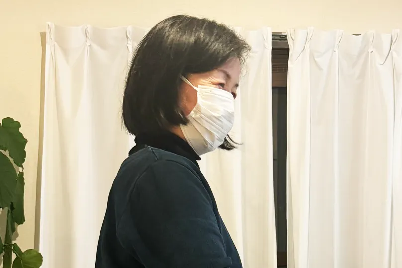 症状が回復した笑顔の女性